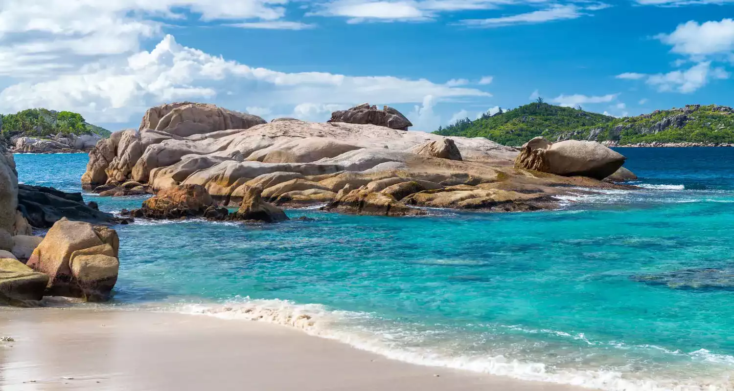 Crystal clear water and granite rocks on the Felicite Island in Seychelles.